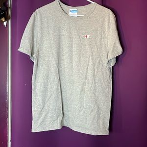 I am selling this Gray champion Shirt. Color: Gray. Size. Medium